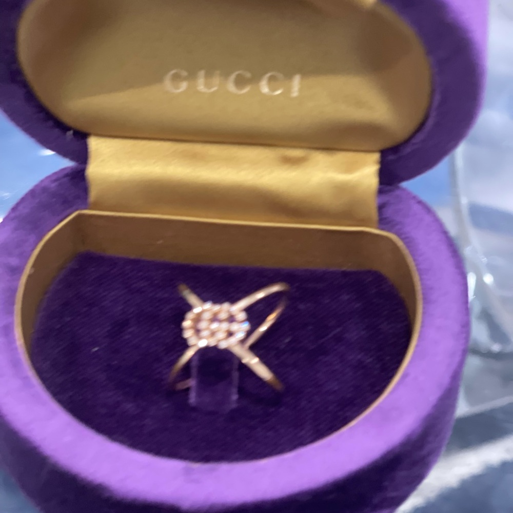 18k yellow gold Gucci brand new  x shaped fully encrusted with faceted diamonds